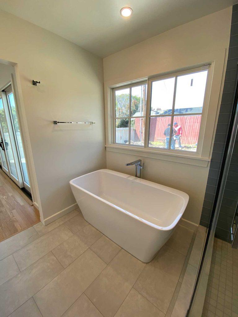 white bathtub in bathroom